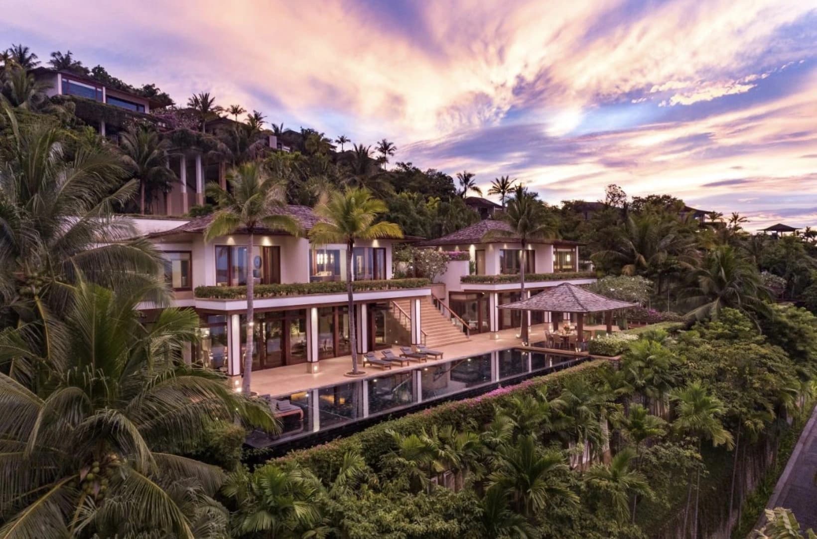 Forensic architectural view of an Andara Resort penthouse featuring a rooftop infinity pool and Andaman Sea panoramas.